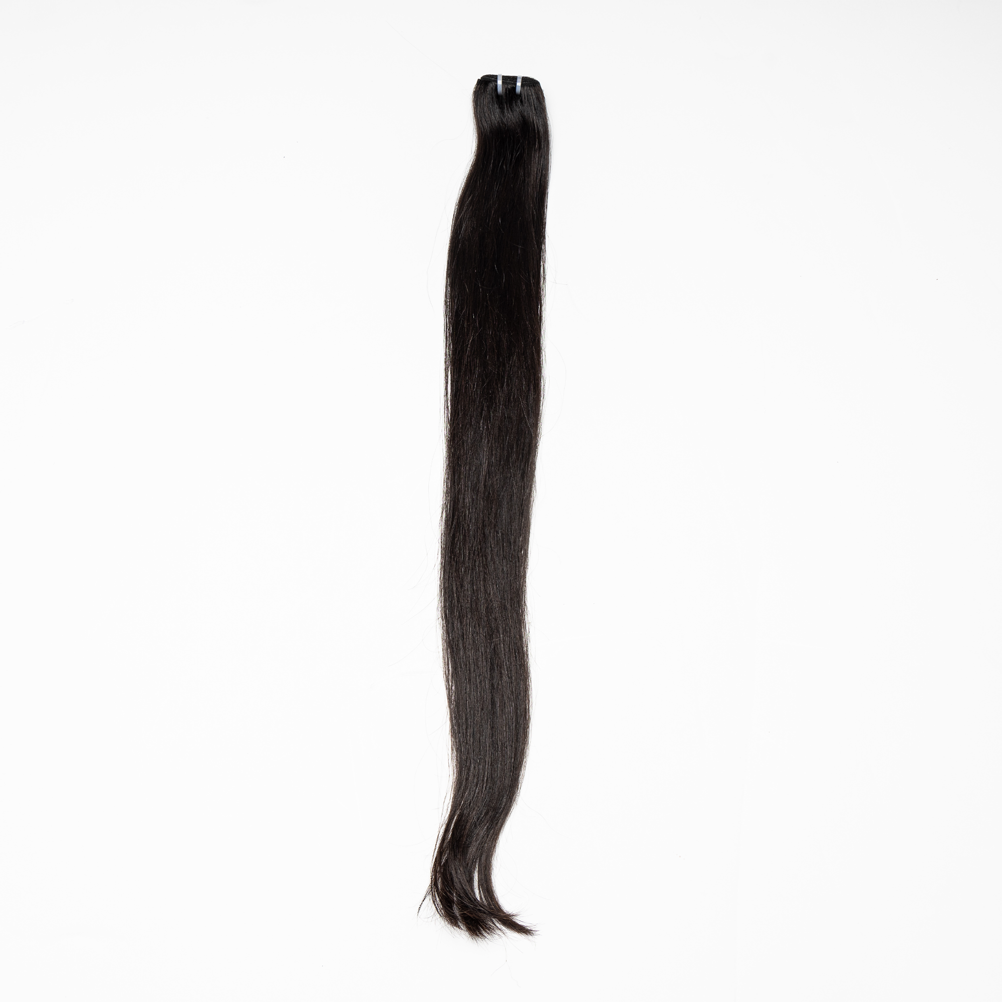 Silky, Soft Human Hair Extensions. Minimal Shedding. Can be bleached and styled as desired.